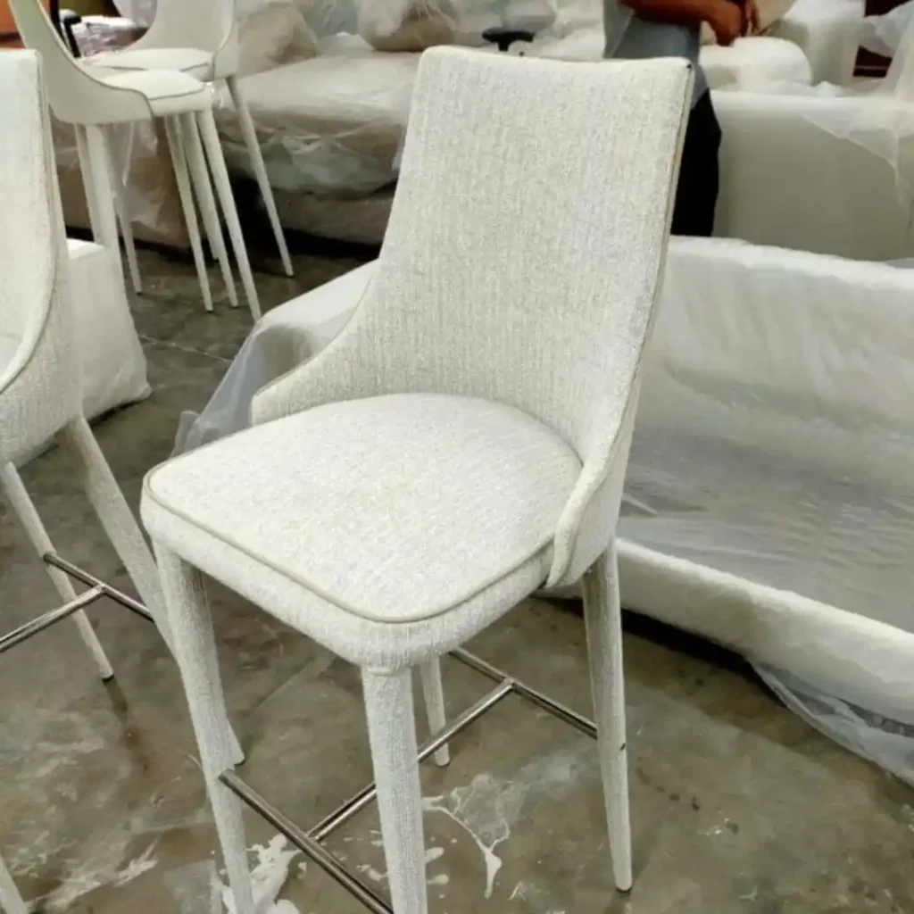 Before and after of chair reupholstery showcasing Effective Chair Repair Techniques