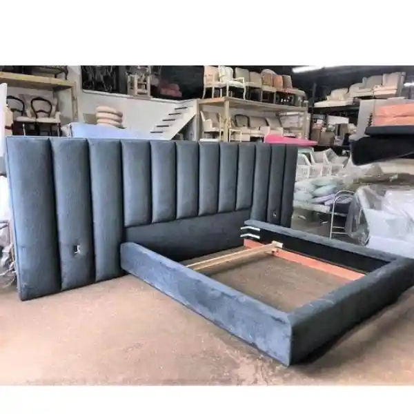 Custom upholstered bed frame with channel tufted headboard in Dubai