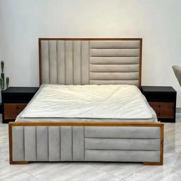 Custom upholstered bed with modern fabric headboard and wooden frame in Dubai
