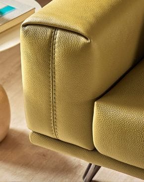 Premium leather sofa upholstery with detailed stitching in Dubai