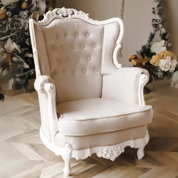 Luxury white wingback chair upholstery with button tufting in Dubai